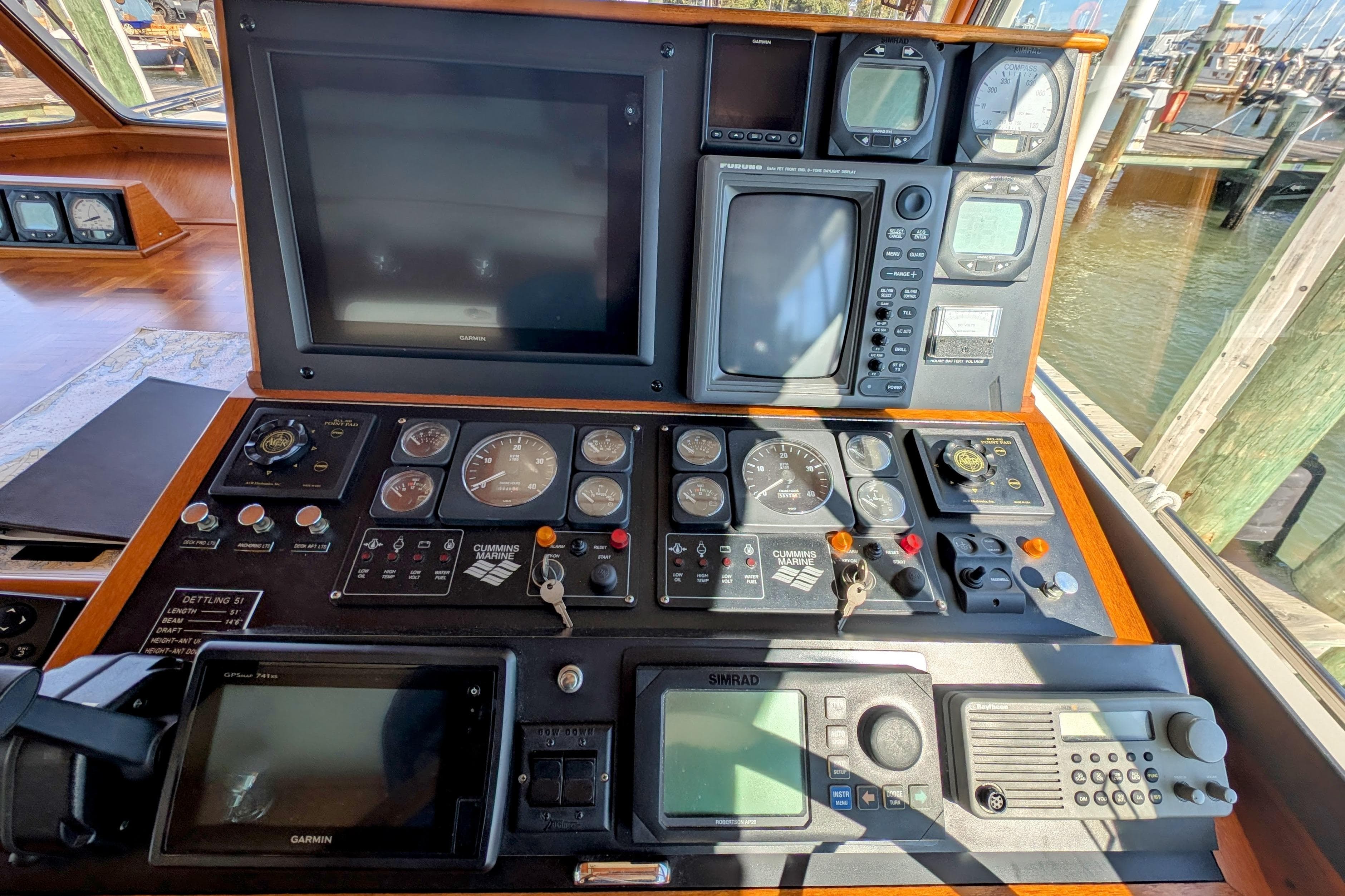 Control panel of a 2001 Dettling 51 boat with navigation and communication equipment.