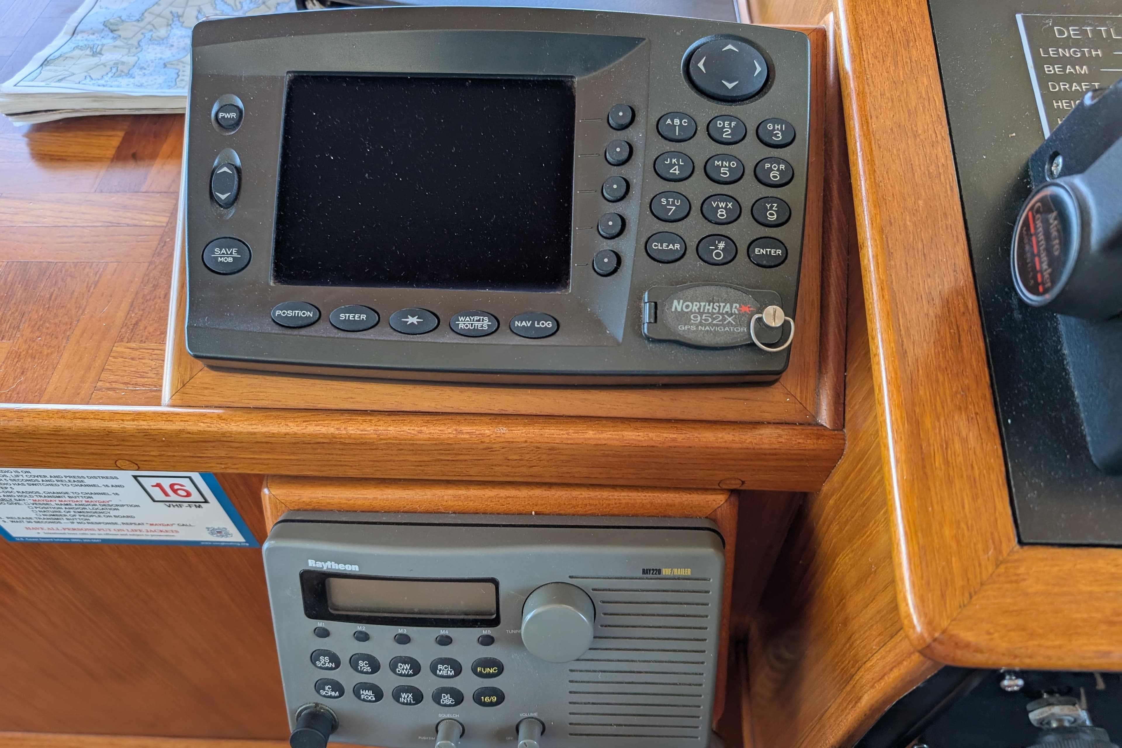 Boat navigation equipment on a Dettling 51, 2001 model, featuring GPS and radio systems.
