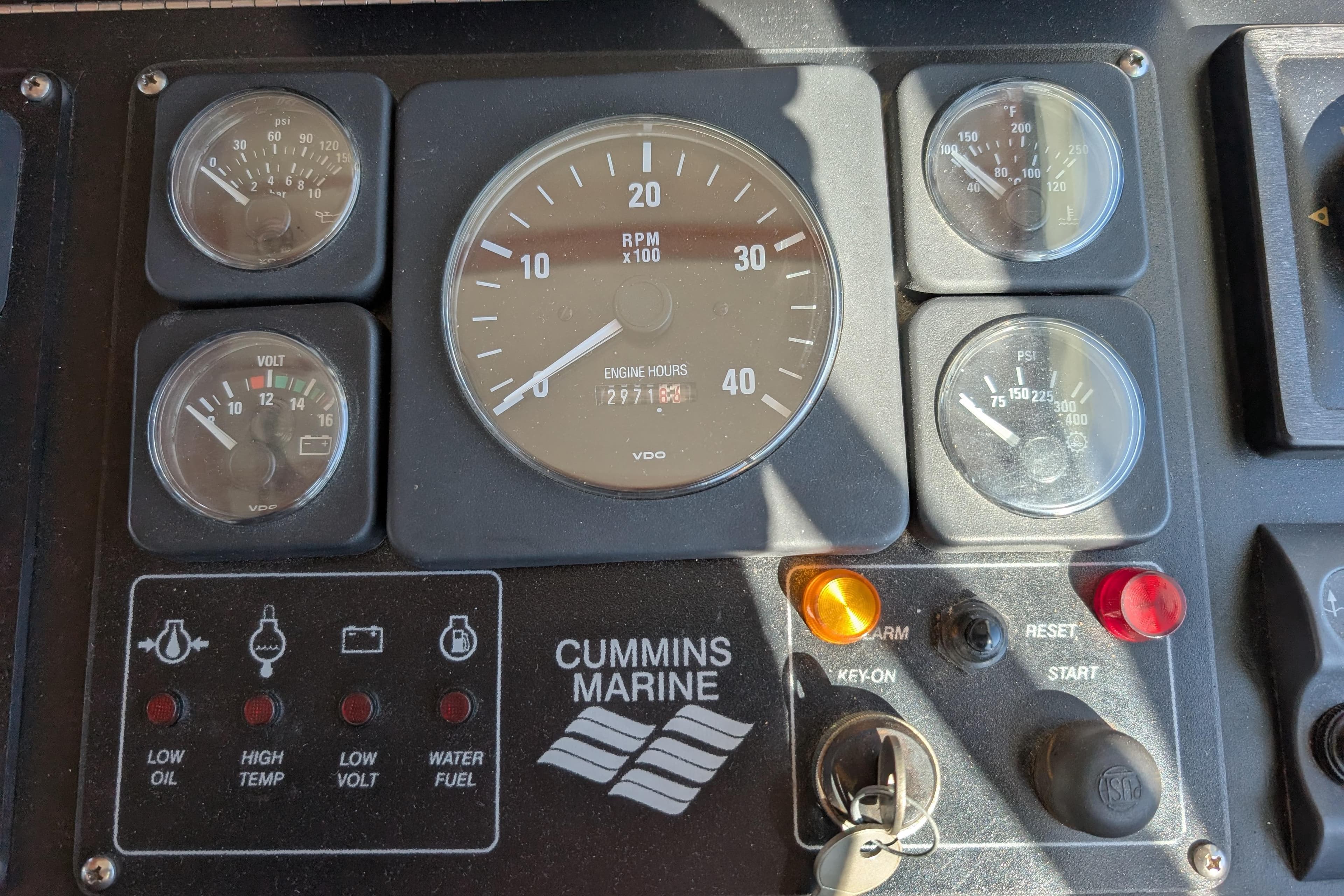 Control panel of a 2001 Dettling 51 boat with Cummins Marine engine gauges.