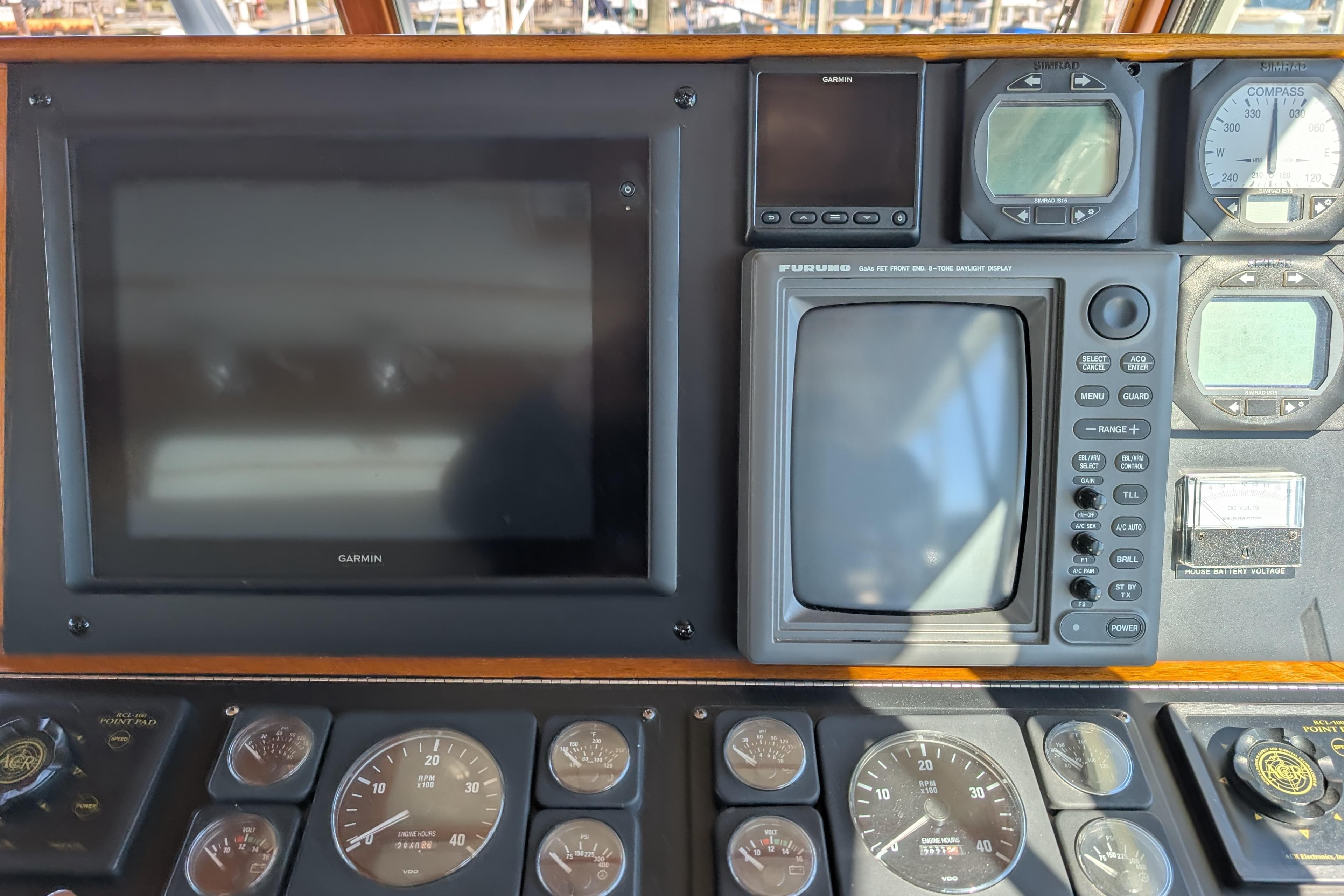 Control panel of a 2001 Dettling 51 boat with navigation instruments.