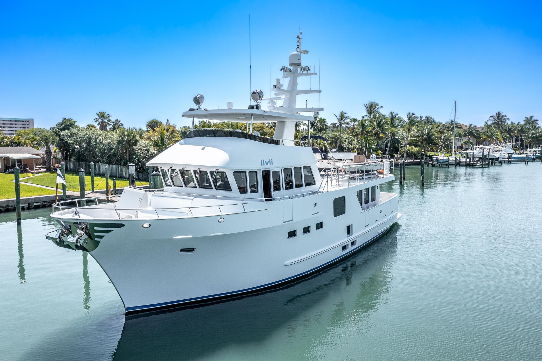 2017 Northern Marine Expedition yacht docked in a serene marina setting.