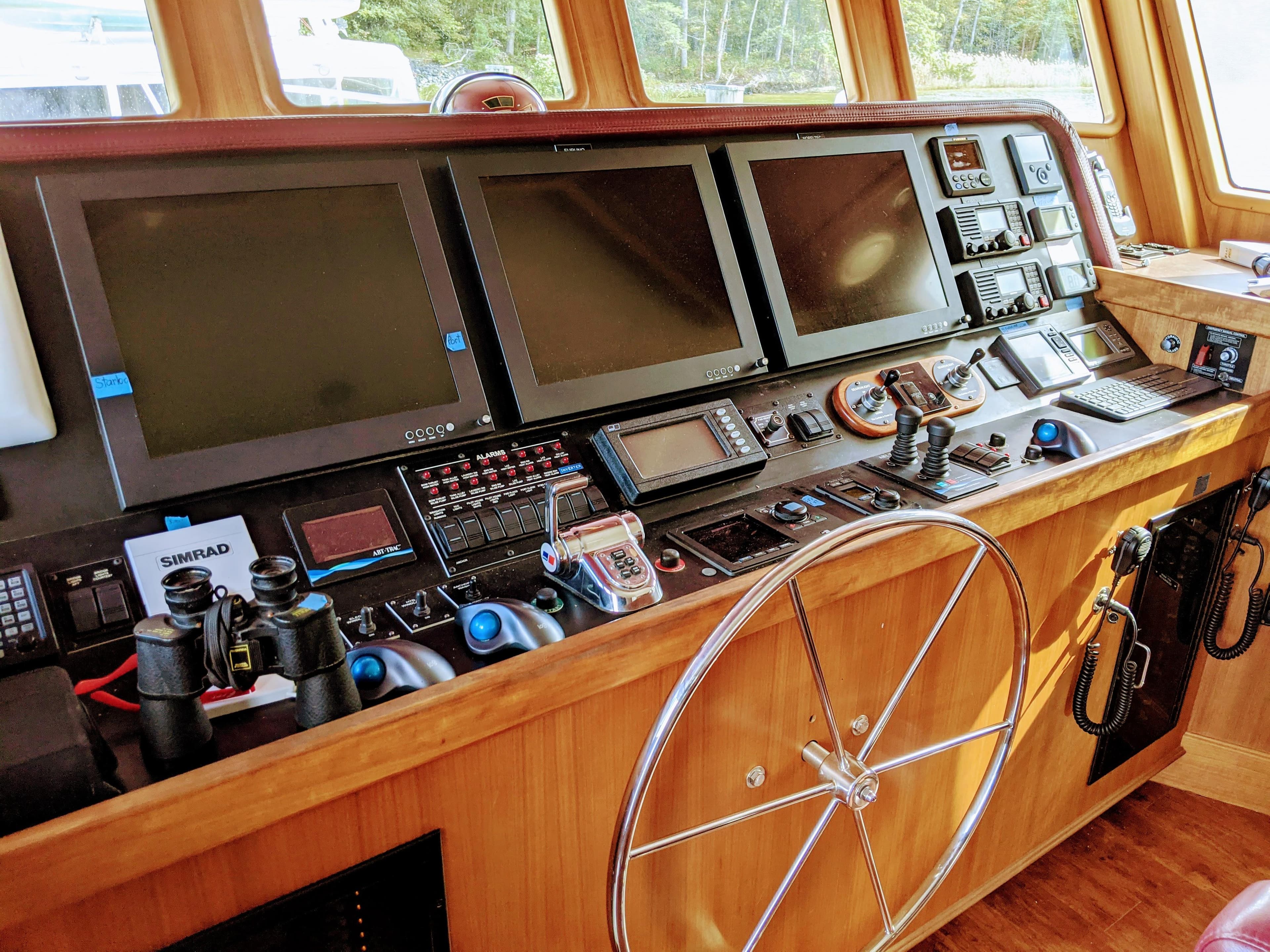 2017 Northern Marine Expedition yacht helm with advanced navigation systems and controls.