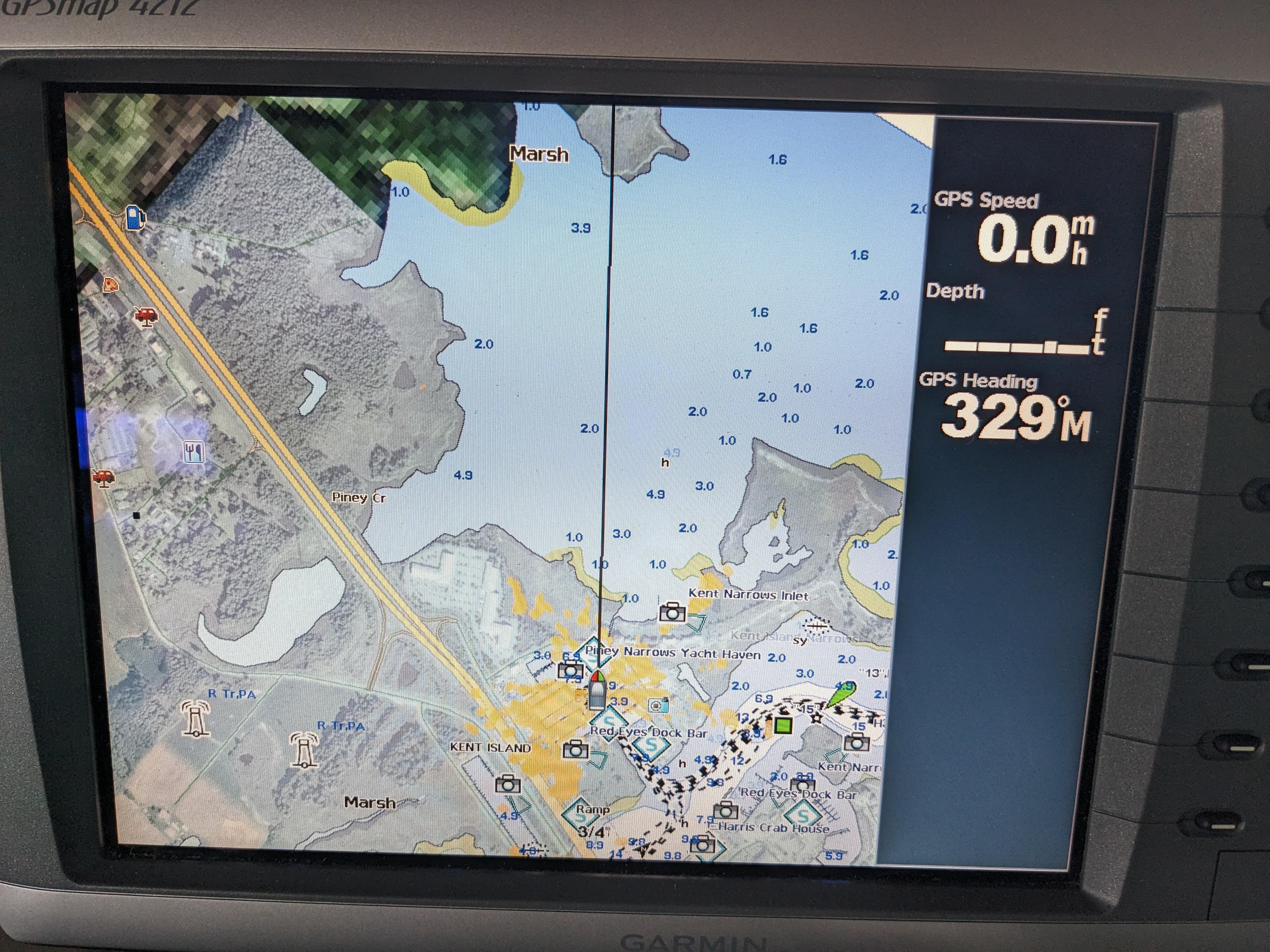 Garmin GPS display on 1988 Sea Ray 390 Express Cruiser showing map and navigation data.