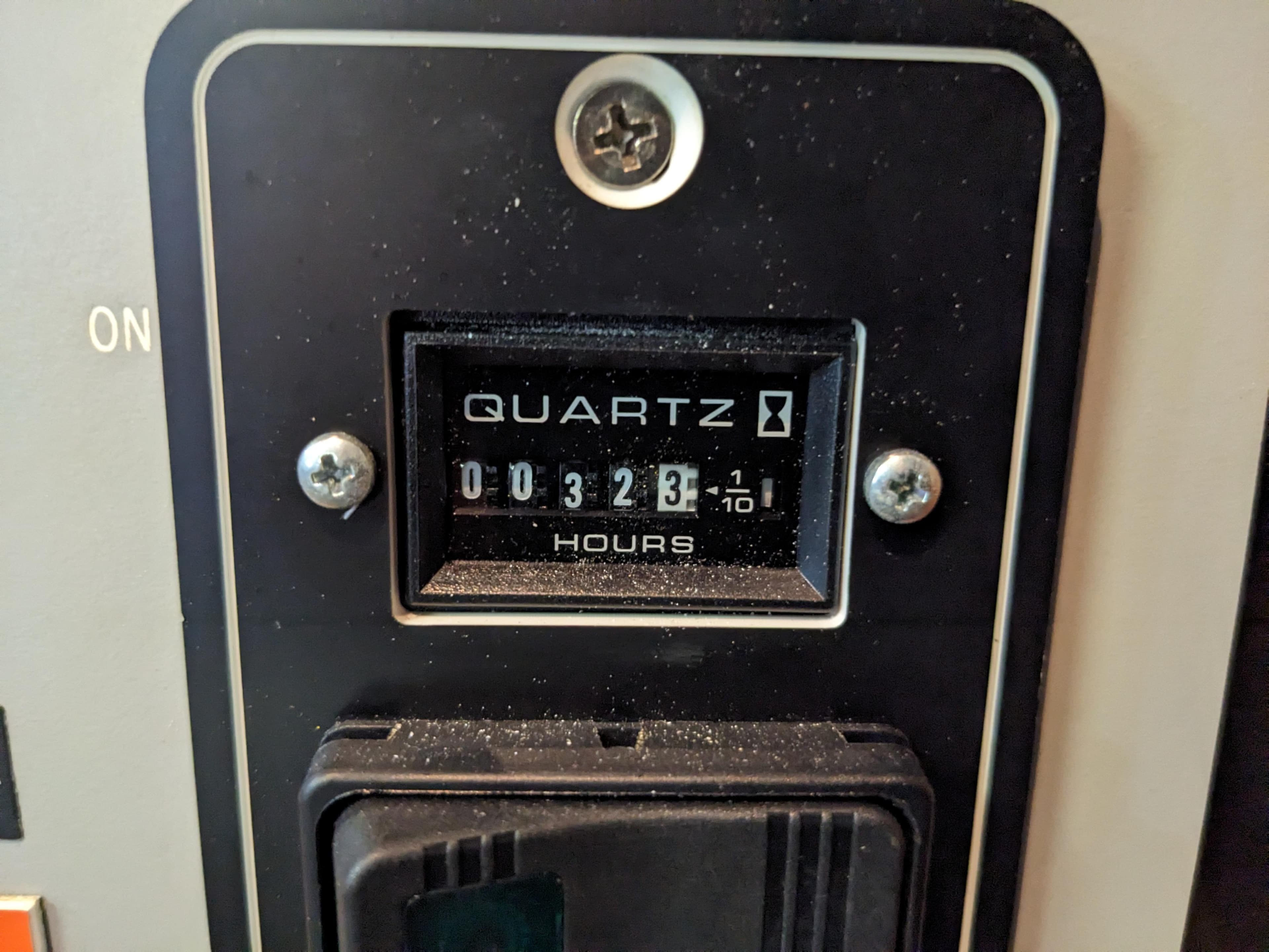 Hour meter showing 323.1 hours on 1988 Sea Ray 390 Express Cruiser.